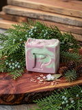 Prudent Preservations artisan bar soap with soft purple and warm cedar brown swirls, handcrafted cold-process.