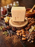 Prudent Preservations artisan bar soap with light brown and tan tones featuring honey-speckled texture, handcrafted cold-process.