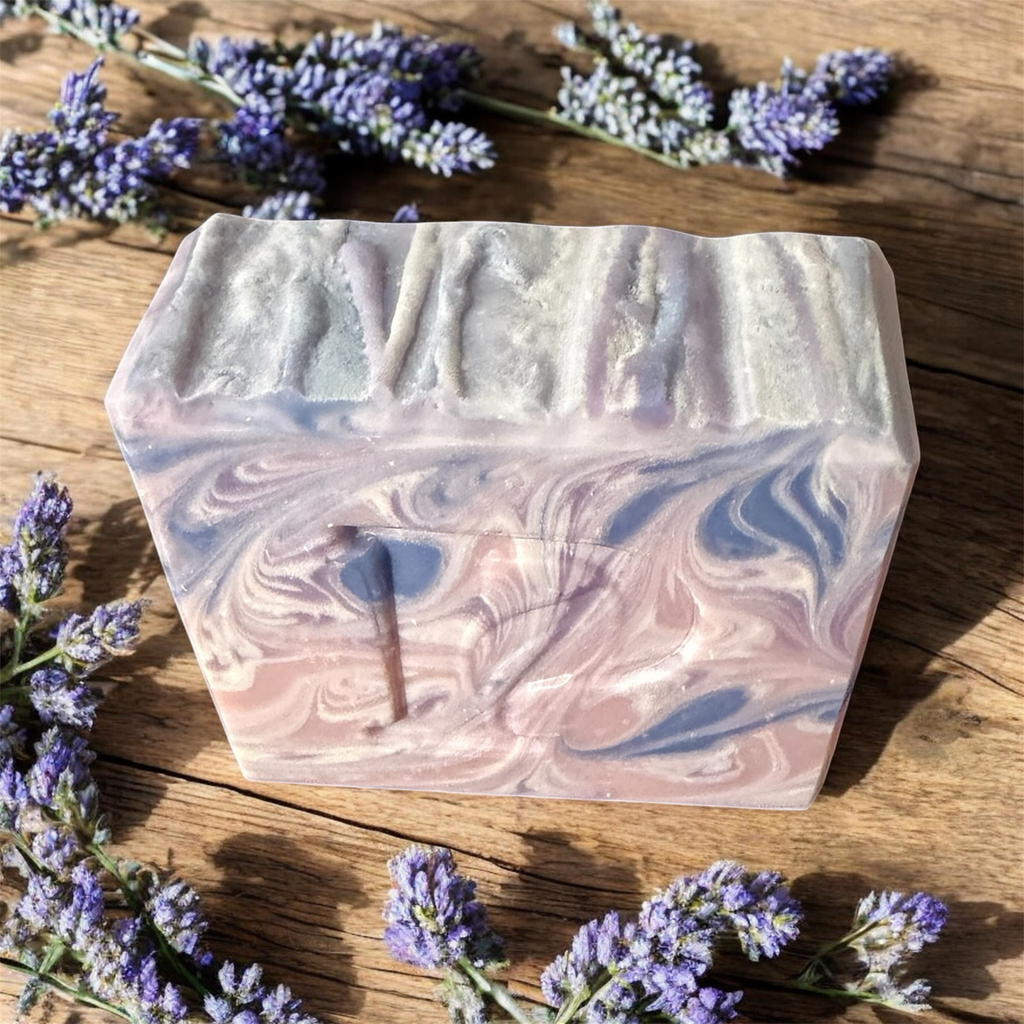 Prudent Preservations artisan swirl soap with calming lavender, lilac, and soft violet marbled design.
