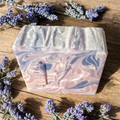 Prudent Preservations artisan swirl soap with calming lavender, lilac, and soft violet marbled design.