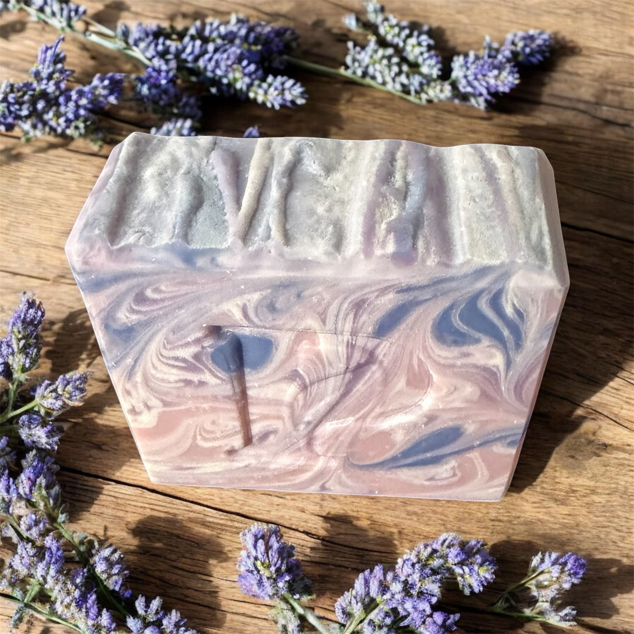 Prudent Preservations artisan swirl soap with calming lavender, lilac, and soft violet marbled design.