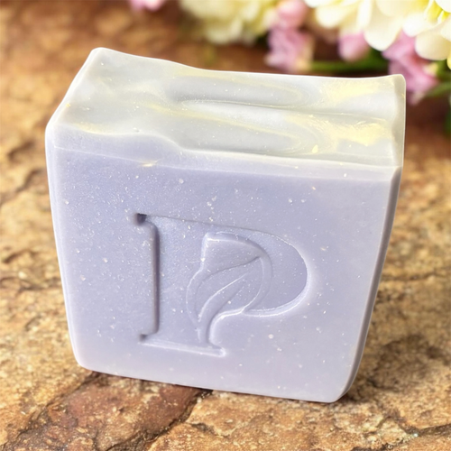 Prudent Preservations artisan lavender bar soap with pearlescent top and embossed logo, flecked with shimmer.